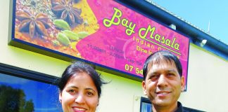 Husband and wife team, Kusma and Vikram Kalura outside their new licenced restaurant The Bay Masala in Welcome Bay.