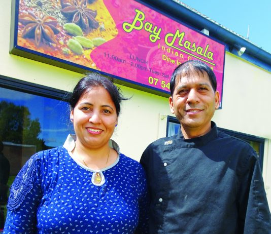 Husband and wife team, Kusma and Vikram Kalura outside their new licenced restaurant The Bay Masala in Welcome Bay.
