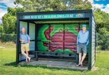 Long time Tauranga resident David Little with local, Antoon Moonen appreciating the brightly adorned side-line shelter at Te Ariki Park, painted by Tautoko Matehaere (a.k.a Sept). Photo: Andy Belcher.