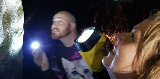 An impressively large nocturnal spider grabs the attention of MP Jan Tinetti and Vaughan Kilburn during a night walk in Aongatete Forest. The walk was part of the Breakfast With The Bird fundraiser event held in the forest every year.