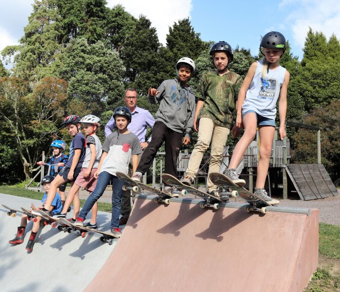 Photograph of Kaimai School pupils with Principal Dane Robertson on their new community skate park.
