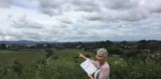 Photograph of a woman overlooking Council owned Smiths Farm