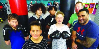 Photograph of the BOP Youth Development Trust boxing team and coach