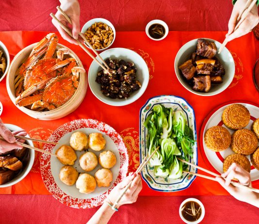 A table with Chinese food on it