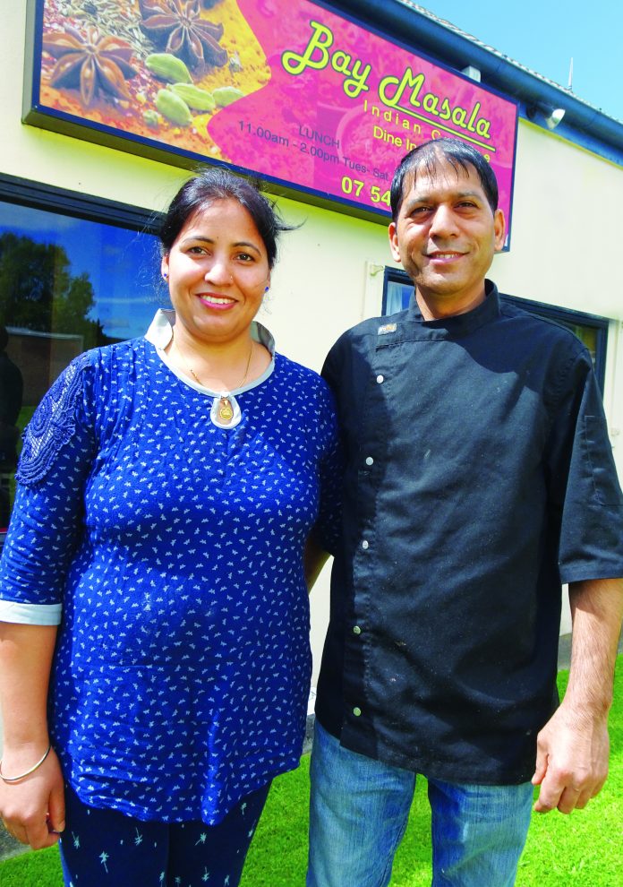 Husband and wife team, Kusma and Vikram Kalura outside their new licenced restaurant The Bay Masala in Welcome Bay.