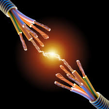 image of two electrical wires with a spark of electricity arcing between them
