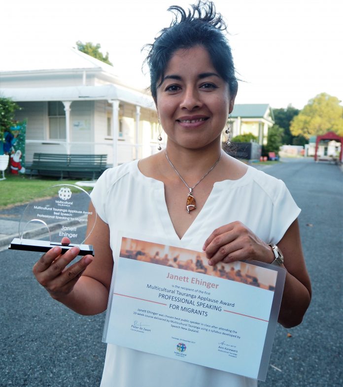 Janett-Ehinger_from-Mexico with award and certificate for Best Speech