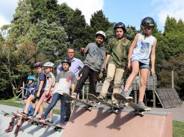 Photograph of Kaimai School pupils with Principal Dane Robertson on their new community skate park.